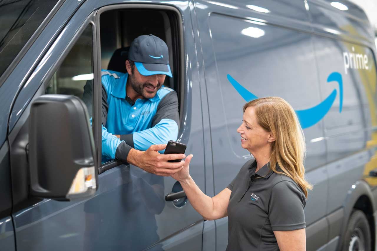 Delivery associate at a van